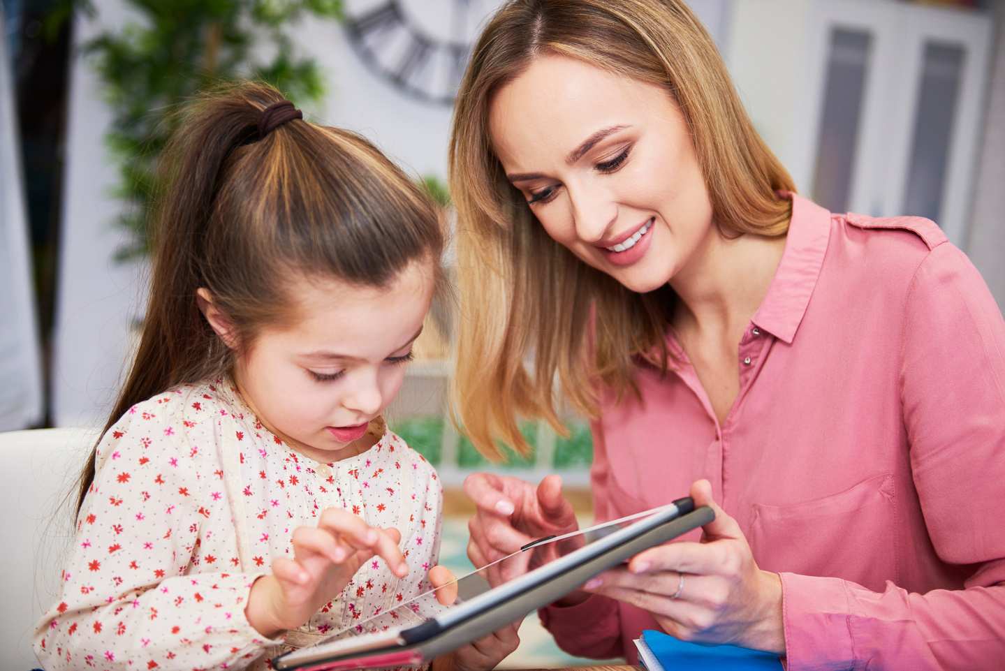 Parent and Child Using Tablet